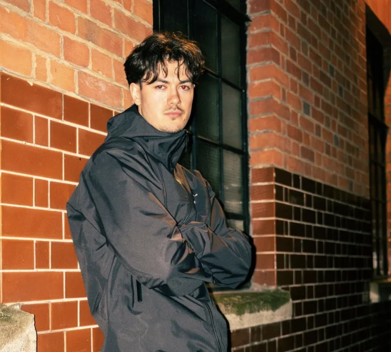 Ethan Walsh, an emerging artist with a distinctive sound and captivating visual identity.